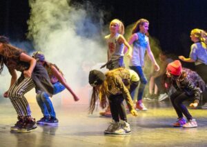 Our group musical theatre syllabus helps learners develop their creative and artistic skills with New Era Academy performance exams.