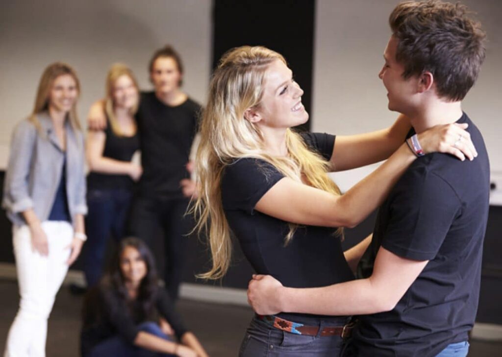 Our musical theatre syllabus helps groups of learners develop their creative and artistic skills with New Era Academy performance exams.